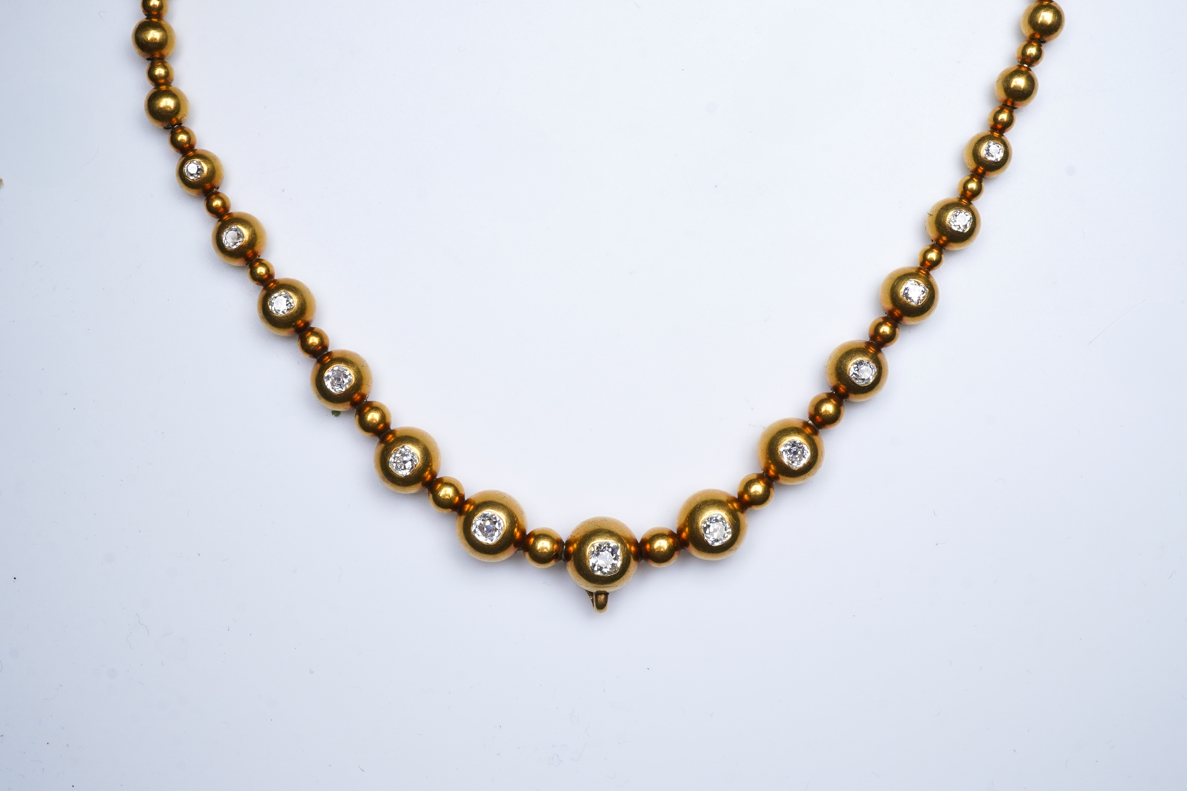 An unusual Victorian gold and diamond necklace, late 19th century